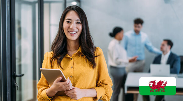 Female holding a notepad in an office