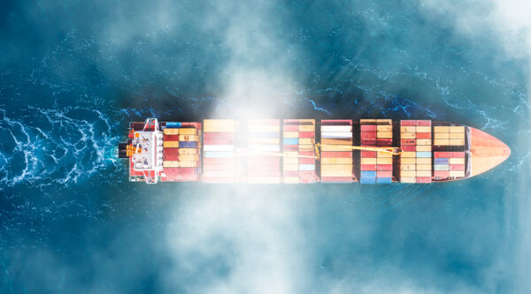 A cargo vessel travelling at sea