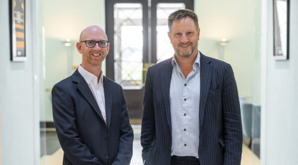 Daniel Goodall joins HCR Law, on the right is Sam Payne