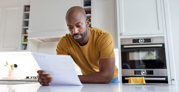 A man checking a professional negligence claim he wishes to file