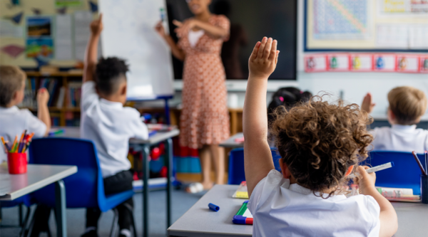 A teacher and their pupils
