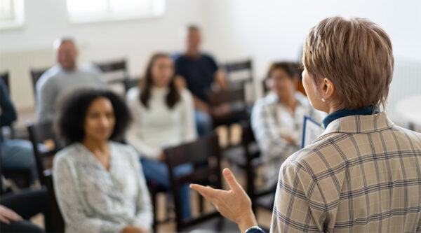 A meeting with academy staff members