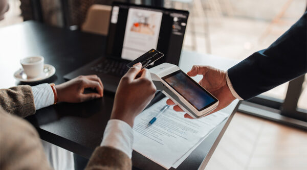 A person using a payment card machine
