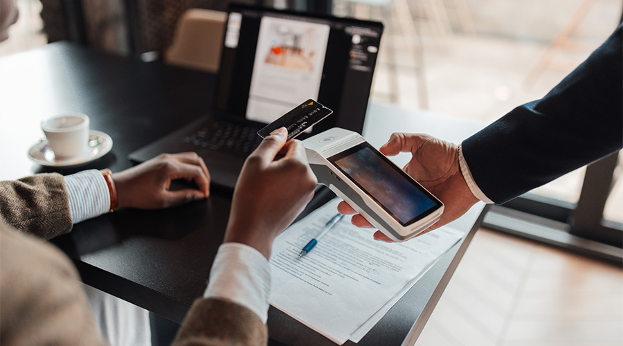 A person using a payment card machine