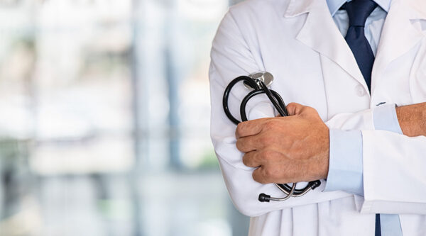 A doctor holding a stethoscope