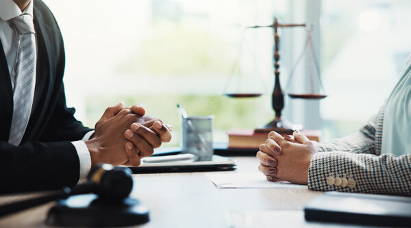 Two litigators sat at a table
