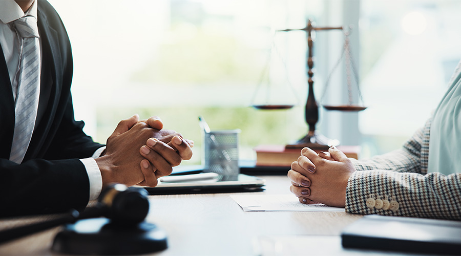 Two litigators sat at a table