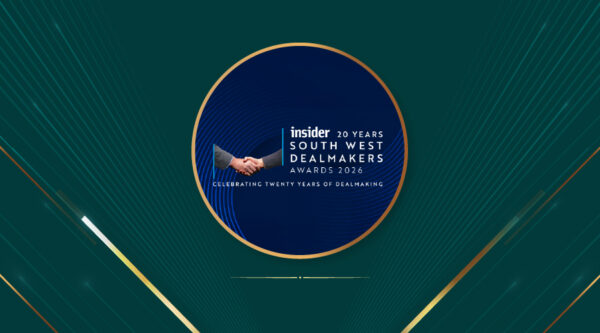 Circular graphic promoting the Insider South West Dealmakers Awards 2026, featuring a handshake inside a dark blue centre with gold accents and the wording “20 years South West Dealmakers Awards 2026 – celebrating twenty years of dealmaking” on a green geometric background.