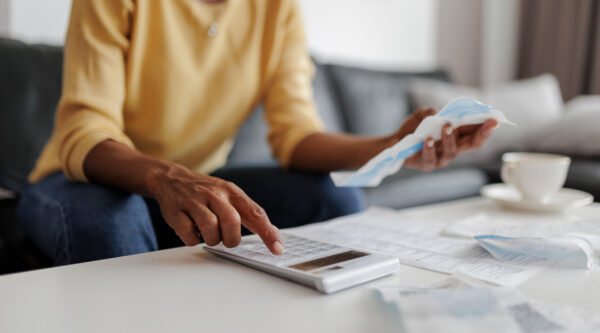 A woman calculating her tax