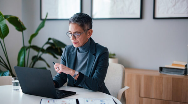 a businesswoman at a laptop