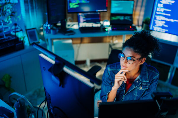 A woman checking a computer